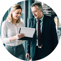 woman-and-man-walking-through-office